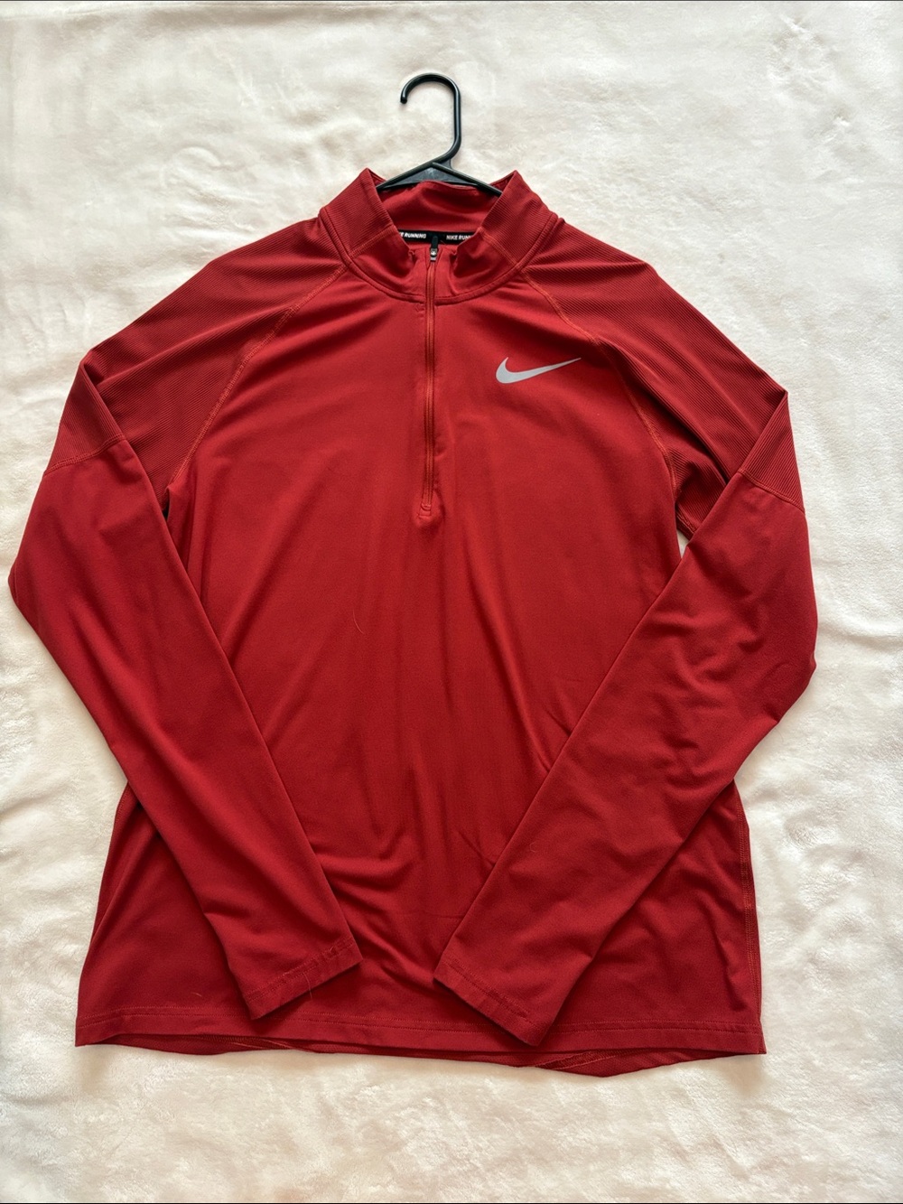 Red-orange Men’s Nike Dri-FIT half-zip pullover